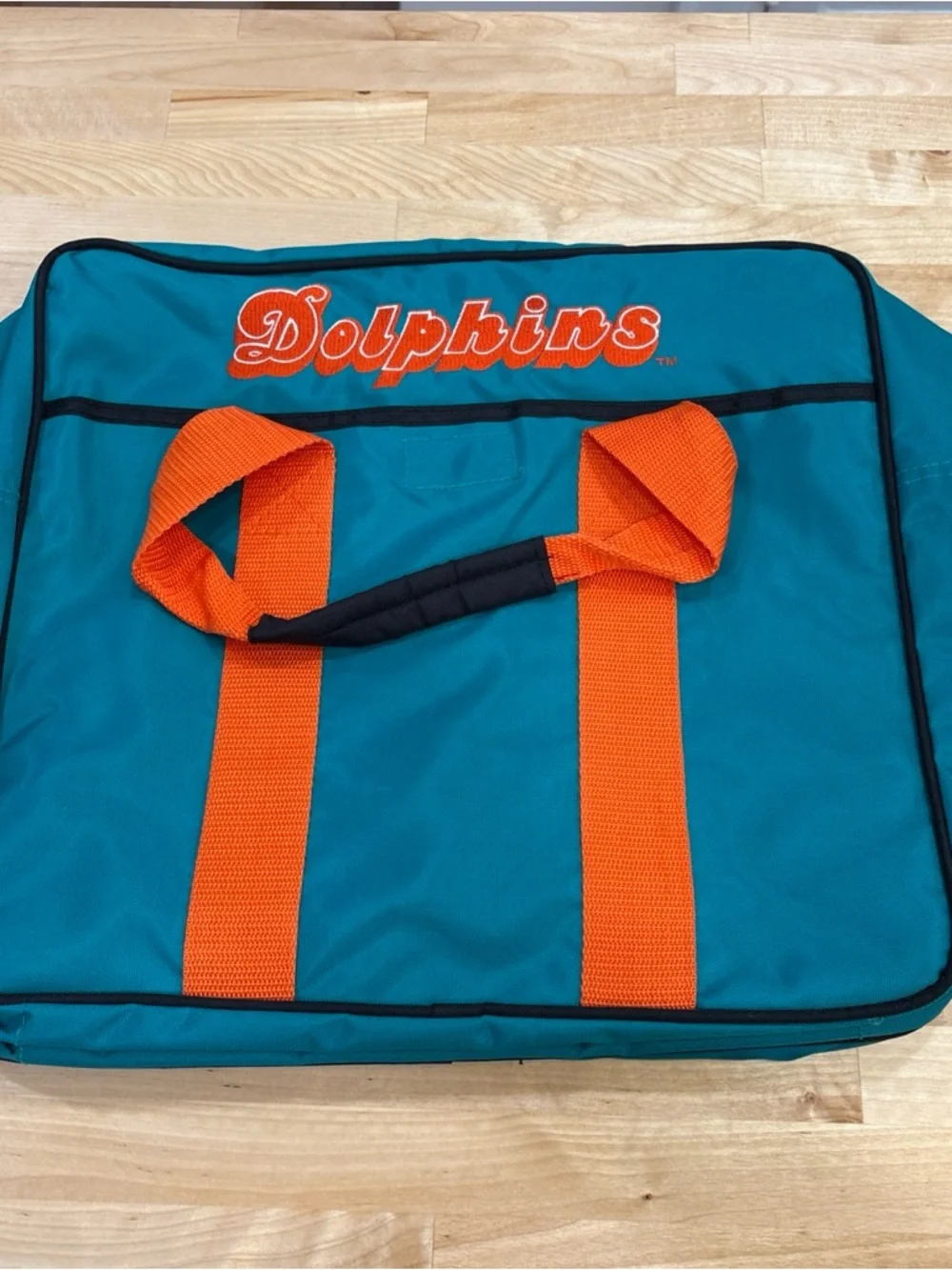 Teal Laptop Briefcase with Orange Handles and Team Emblem